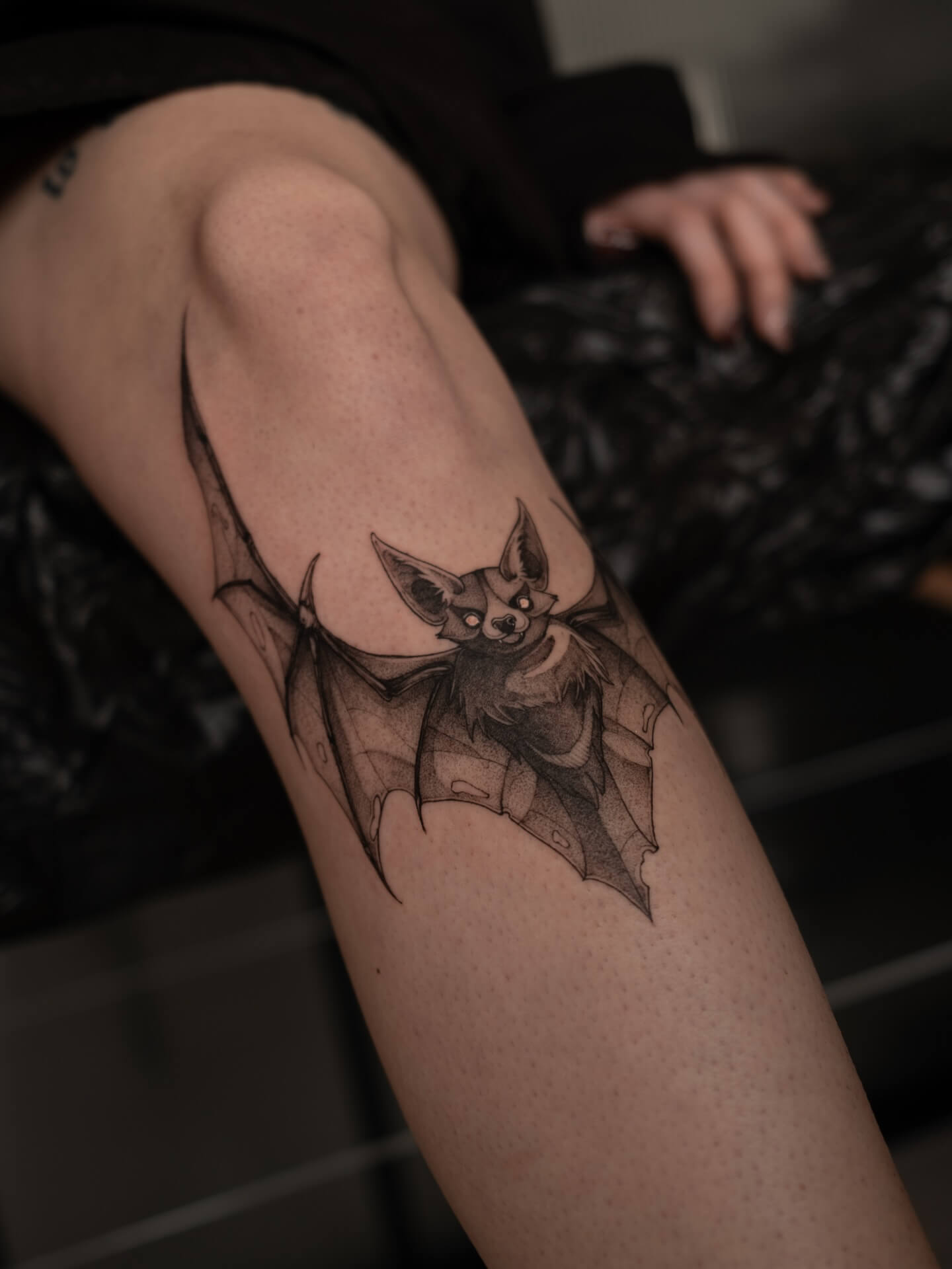 Graphic bat tattoo on inner arm — tattoo Barcelona